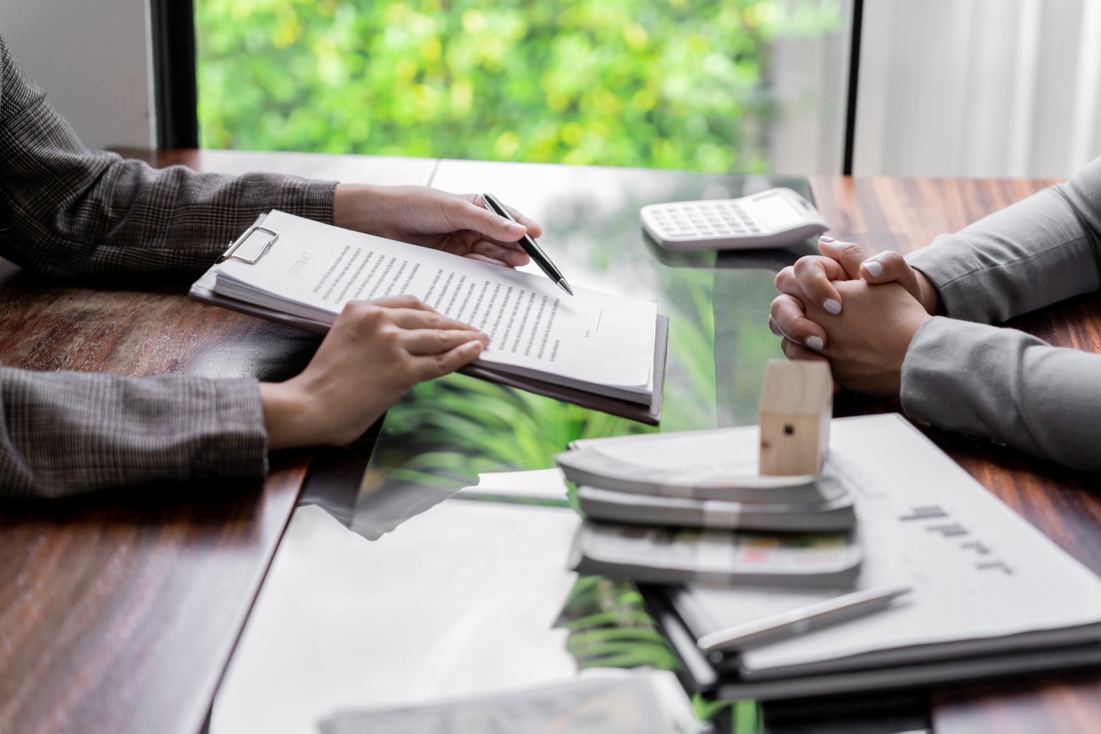 Business people signing contract making deal with real estate agent Concept for consultant home insurance
Real estate investment Property insurance security