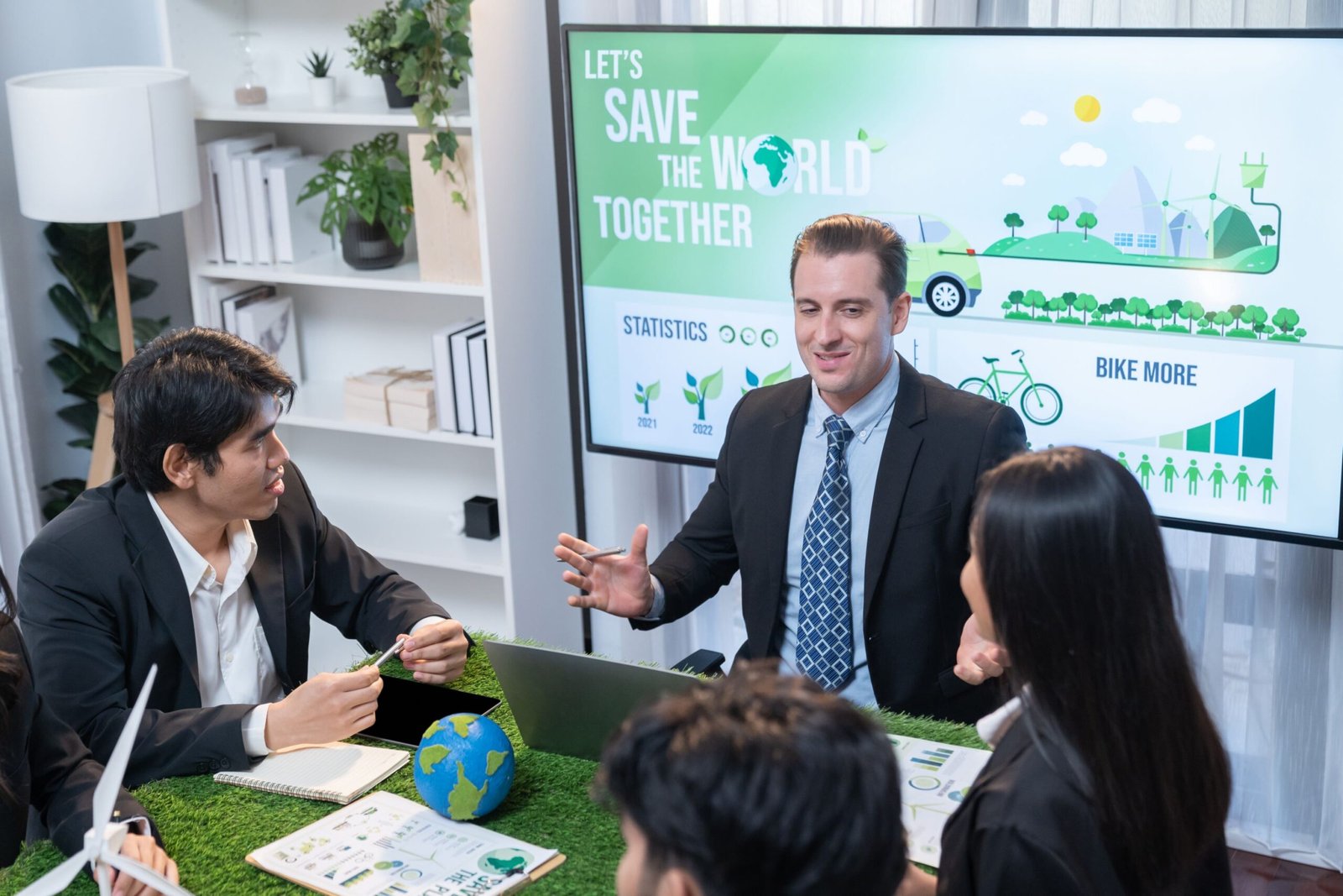 Diverse group of business people planning business marketing investment with eco-friendly policy for greener ecology. Productive teamwork contribute natural preservation and sustainable future. Quaint