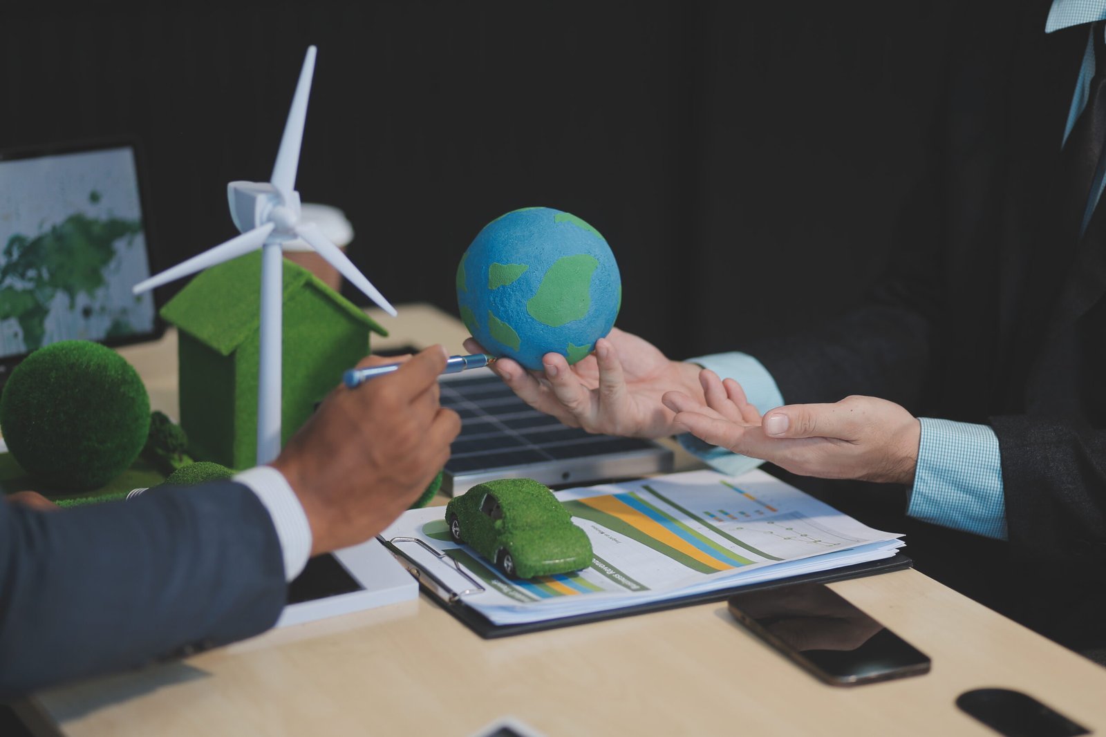 Green energy business company meeting with business people planning and discuss marketing of sustainable and renewable clean energy product with solar cell and wind turbine generator. Trailblazing