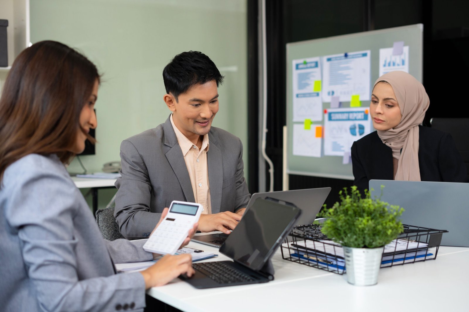 Business team meeting present.professional investor working with new startup project. Finance managers task.Digital tablet laptop computer design smart phone.