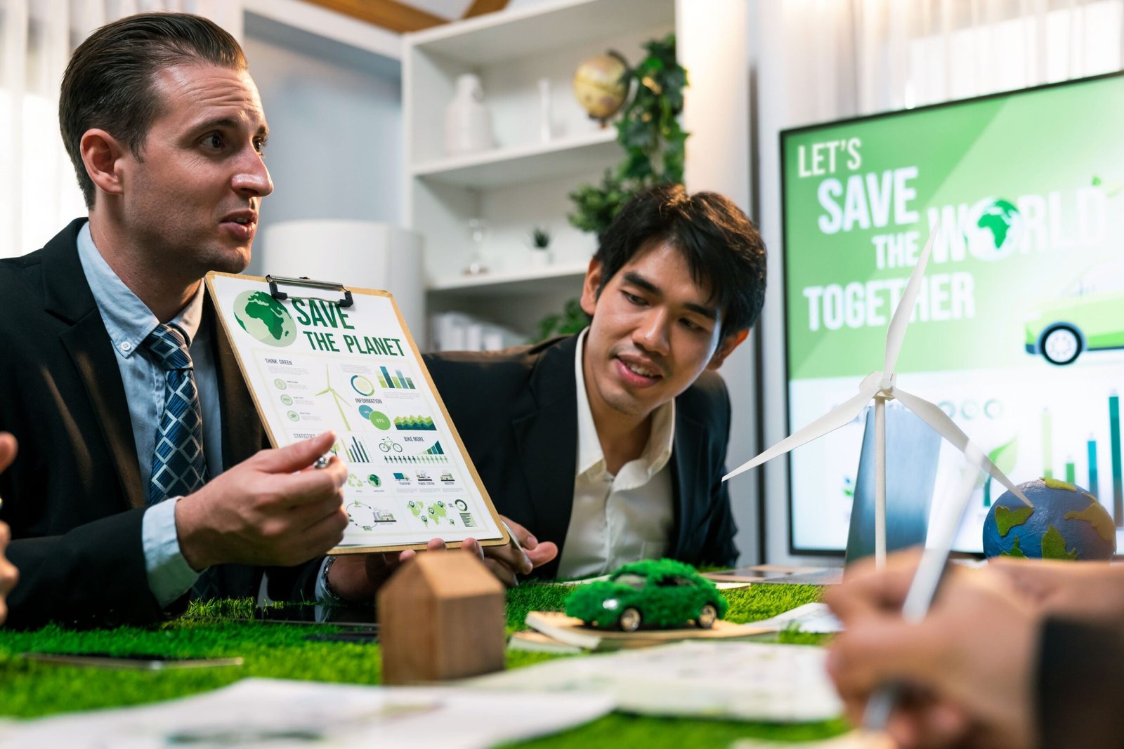 Diverse group of business people planning business marketing investment with eco-friendly policy for greener ecology. Productive teamwork contribute natural preservation and sustainable future. Quaint