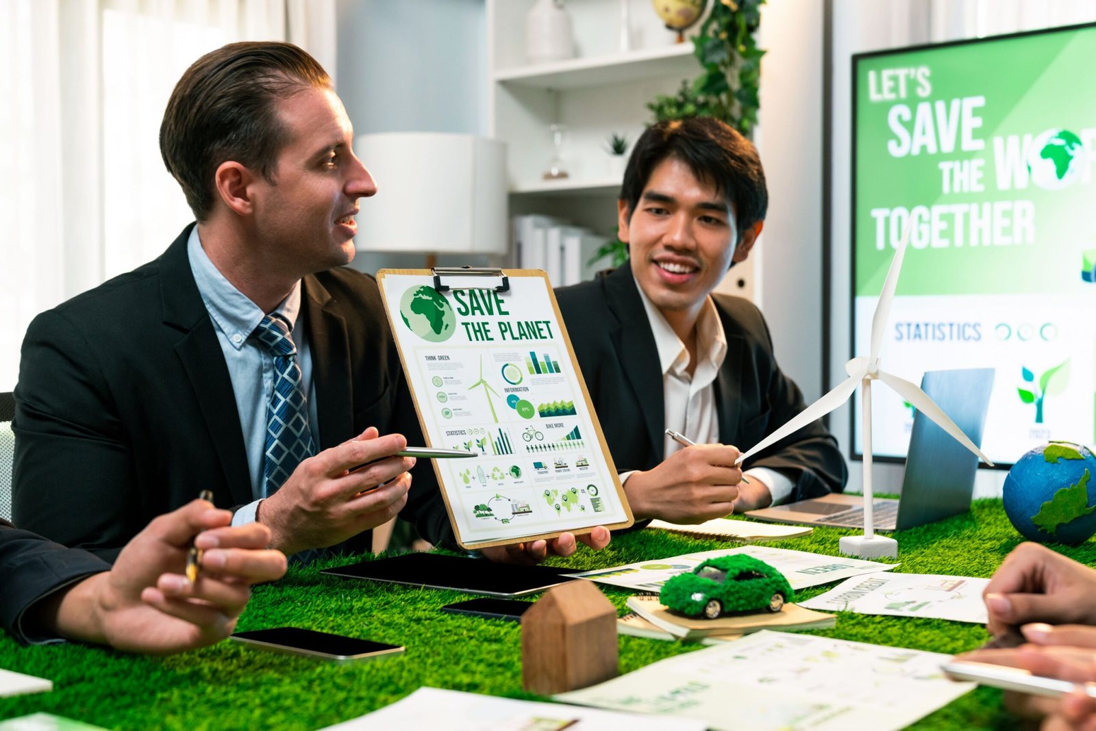 Diverse group of business people planning for alternative energy utilization for greener sustainable Earth by reducing CO2 emission and carbon credit with renewable clean energy technology. Quaint